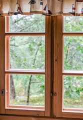 Fototapeta na wymiar Summer storm outdside the summer cottage window