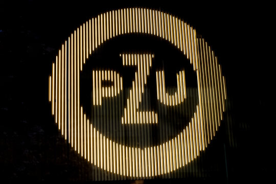 Signboard of the insurance company PZU inside modern office building, Warsaw, Poland, September 10, 2023. 