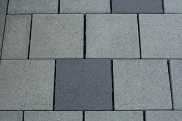 part of Cobblestone concrete patio pavement in different grey colors