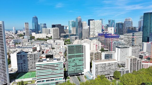 Paris: Aerial view of skyscraper skyline of La Defense, major business district in capital city of France, sunny day with clear blue sky - landscape panorama of Europe from above