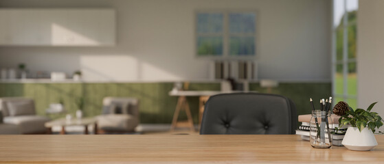 A copy space on a wooden desk with stationery in a modern home living room blurry background.