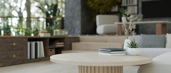 Copy space on a wooden coffee table in a modern contemporary living room. close-up image