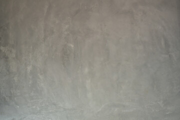 Naklejka premium Texture of gray concrete wall with scratches and cracks. Abstract background.