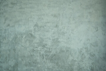 Texture of gray concrete wall with scratches and cracks. Abstract background.