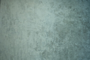 Texture of gray concrete wall with scratches and cracks. Abstract background.