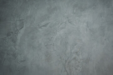 Texture of gray concrete wall with scratches and cracks. Abstract background.