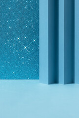Abstract geometric blue and shiny sparkling background for the presentation of a cosmetic product or gift. Empty premium podium, scene. Showcase, display case.