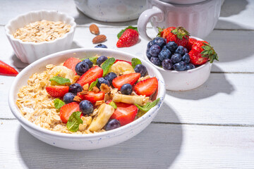 Sweet summer breakfast oatmeal with berry