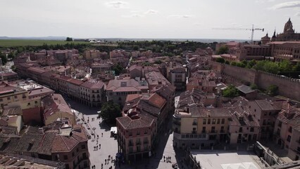 Bustling city center of Segovia, Spain. Aqueduct revealed. Aerial view