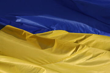 close up of waved flag of Ukraine
