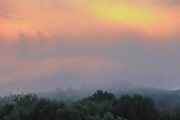 Obraz na płótnie Canvas Sunrise in the mountains after rain.