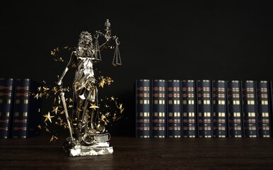 Fototapeta na wymiar Star Lawyer - Lady Justice Statue with stars and law books