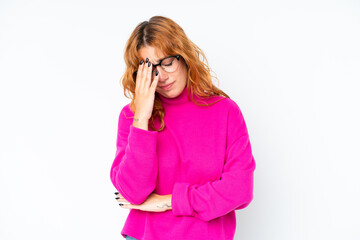 Young caucasian woman isolated on white background with headache