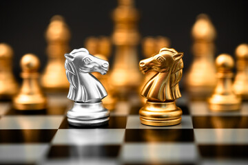 The knight horse game chess piece placing face to face represent business opponent join talking...