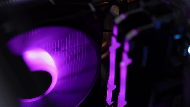 Dnieper. Ukraine 11.05.2023: Computer fan. DDR4. Modern case cooling system. Installation of HTPC, Hackintosh PC and Gaming PC with liquid cooling system and full ARGB lighting inside