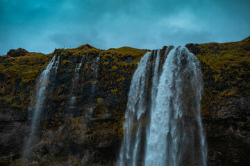 Kvernufoss a 30-meters high waterfall accessible via a rugged hiking trail in Iceland