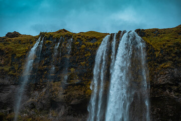 Kvernufoss a 30-meters high waterfall accessible via a rugged hiking trail in Iceland