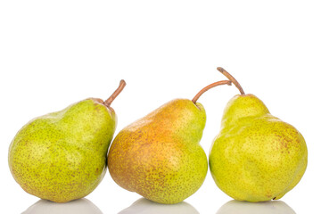 Three juicy sweet pears, macro, isolated on white background.