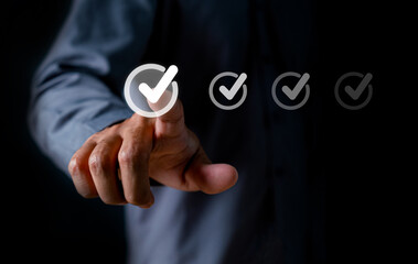 Hand ticking correct mark, checklist and check mark concept, check mark on finger, correct concept