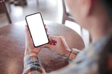 cell phone blank white screen mockup.hand holding texting using mobile on desk at office.background empty space for advertise.work people contact marketing business,technology