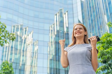 Fototapeta premium Business woman celebrate success after closing a deal