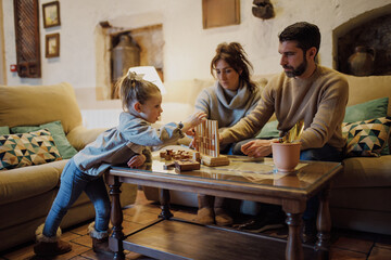 Family Game Night: Quality Time and Laughter in Cozy Rustic Home - Making Precious Memories Together.