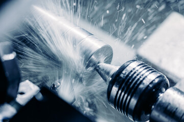 Auto CNC turning with robot drill milling factory with water coolant streams. Concept banner metal machine industry background. © Parilov