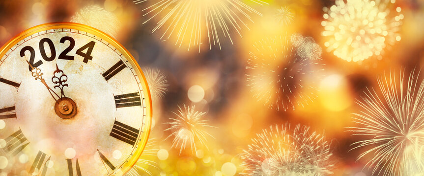 2024 New Year With Clock Counting Down To Midnight With Defocused Golden Background And Fireworks