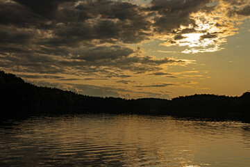 view over lake Maly near Stare Jabłonki in Poland in sunset 