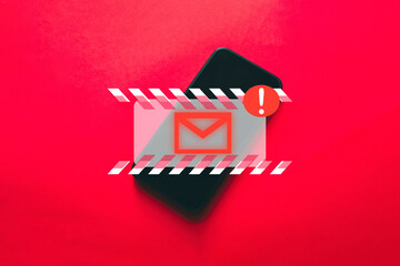 Naklejka premium SPAM amd virus email,Alert email,notification,cyber sercurity,Digital crime,Network security,Data protection concept.Smartphone on red background with email warning icon idea for business,technology.