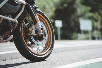 Motorcycle in a sunny motorbike on the road riding.with sunset light. copyspace for your individual...