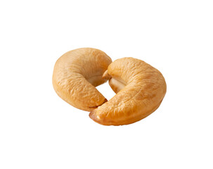 Top view of two Roasted brown cashew nuts in stack isolated on white background with clipping path. Close up photo