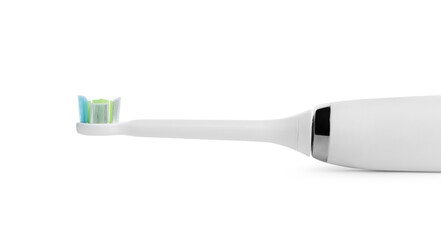 Electric toothbrush on white background, closeup view