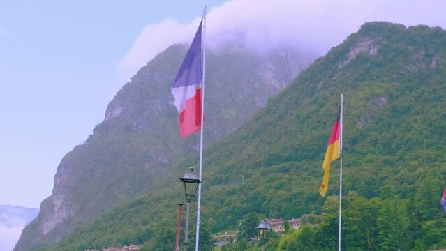 Silk national flags of France and Germany representing their respective countries, concept of significance and meaning behind flags of different nations, independence day, Cultural Symbolism