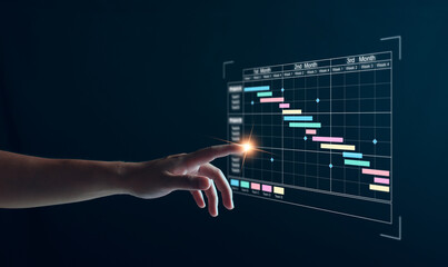 Project manager working on tablet and updating tasks and milestones progress planning with Gantt chart scheduling interface for company on virtual screen. Business Project Management System.