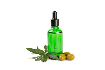 Olive essential oil. Glass bottle with olive oil isolated on a white background. Cosmetic oil.