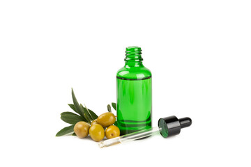 Olive essential oil. Glass bottle with olive oil isolated on a white background. Cosmetic oil.
