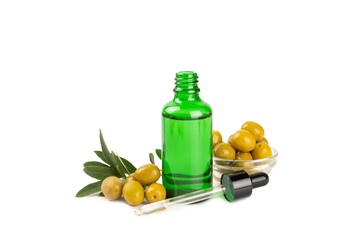 Olive essential oil. Glass bottle with olive oil isolated on a white background. Cosmetic oil.