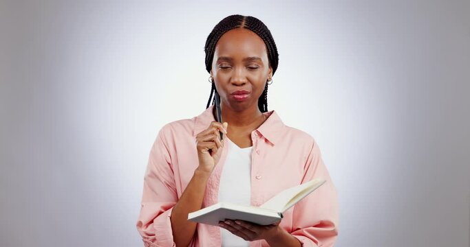 Idea, thinking and black woman writing in book at studio isolated on white background mockup space. Inspiration, serious and notebook for creative brainstorming, planning list in journal and reminder