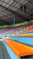 Spectator seats in an empty stadium