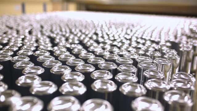 Conveyor line with the production of aluminum cans. Production of aluminum cans for drinks. Plant of high-tech equipment for the food industry.