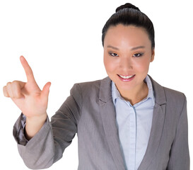 Digital png photo of smiling asian businesswoman pointing on transparent background