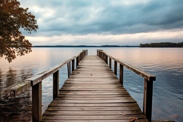Fototapeta na wymiar A wooden dock sitting next to a body of water