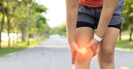 Injury from workout concept. Running sport injury leg pain. Runner woman massaging sore calf...