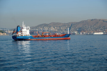 Fototapeta premium Container cargo ship loaded arrives at Piraeus port, Greece. Import export business and logistics.