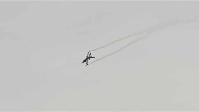 IZMIR, TURKIYE - September 9, 2023 Turkish Air Force General Dynamics F-16C Fighting Falcon SoloTurk (4R-23) Aerobatic Demonstrate over Izmir City During Liberation Day Air Force Footage.