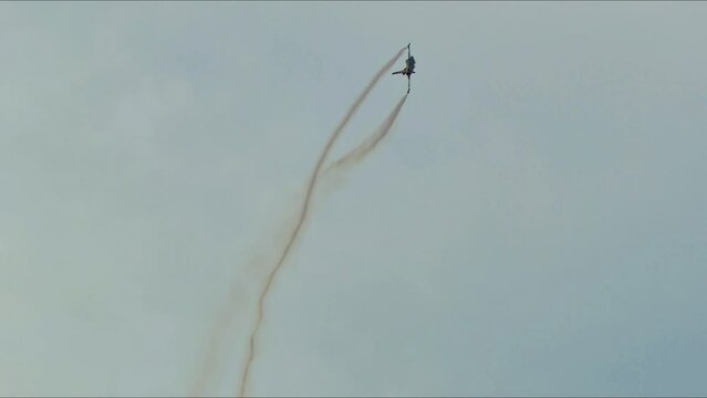 IZMIR, TURKIYE - September 9, 2023 Turkish Air Force General Dynamics F-16C Fighting Falcon Solo Turk (4R-23) Aerobatic Demonstrate over Izmir City During Liberation Day Air Force Footage.