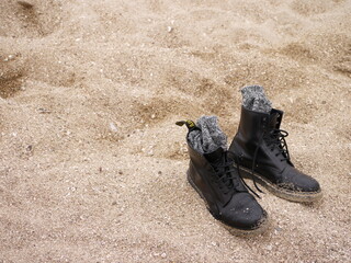 砂浜とブーツ