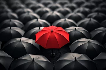 Foto op Plexiglas Red umbrella stand out from the crowd of many black and white umbrellas. Business, leader concept, being different concepts © Fabio