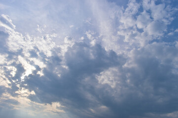 beautiful blue sky and cloud with golden ray sunrise in the morning, natural background